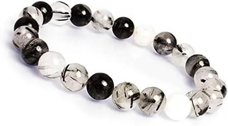 Rutilated Quartz for Spiritual Growth & Protection  by Raw Spiritual