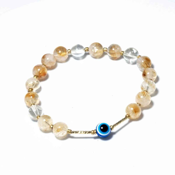 Citrine & Evil Eye for wealth, positivity & manifestation. Zodiac: Aries, Gemini, Leo