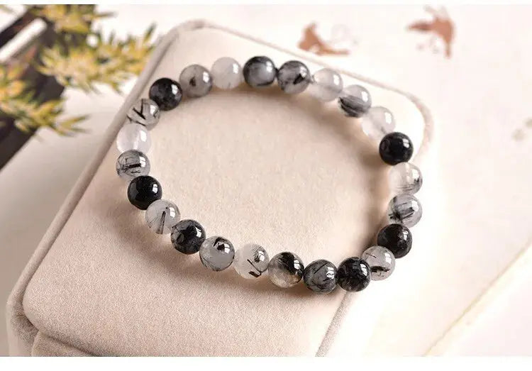 Rutilated Quartz for Spiritual Growth & Protection  by Raw Spiritual