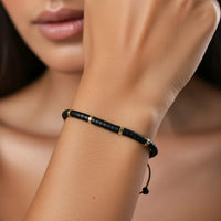 سوار مضفر من حجر السج الأسود للحماية