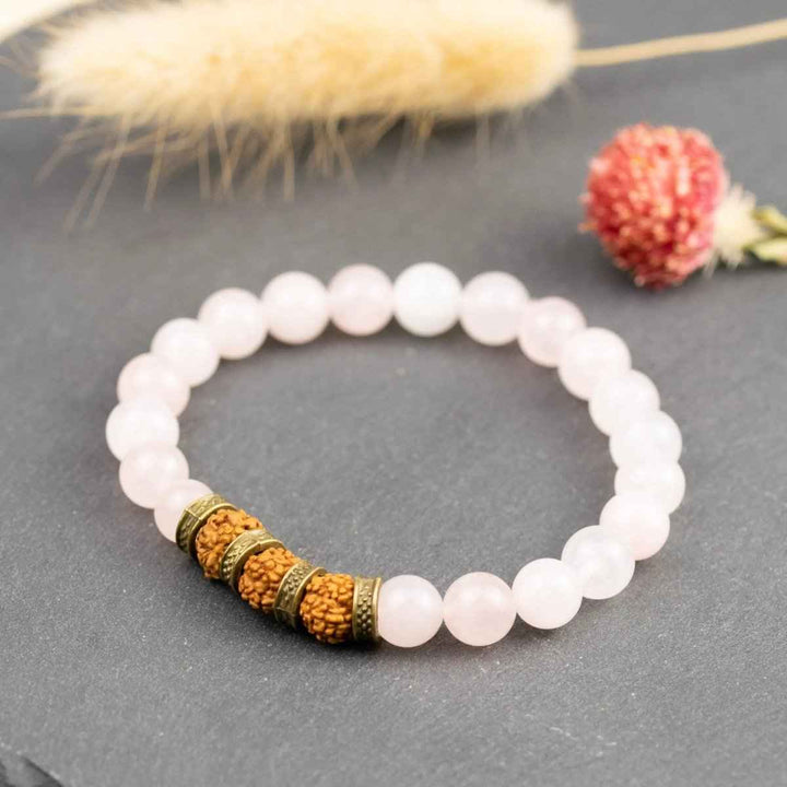 Rose Quartz with 5 Mukhi Rudraksha for love, healing, protection, sprititual growth & emotional balance. Zodiac: All